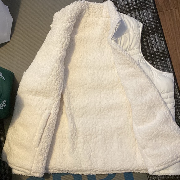 Reversible Sherpa lined puffy vest. - Picture 2 of 2